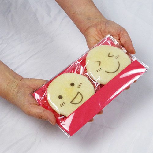 ○ほほえみ(笑)せんべい（2枚透明袋入り）｜みなとや